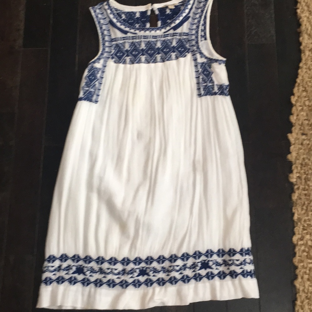 Lucky sundress with embroidered design.